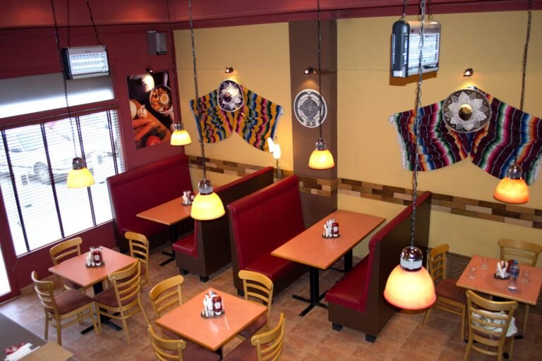 Red booths and Tex-Mex decor at Frank’s A Lot